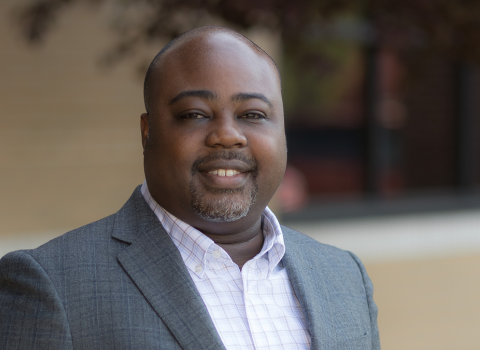 Headshot of Tim Owolabi, who graduated from the Northwestern SPS online MS in Health Analytics program