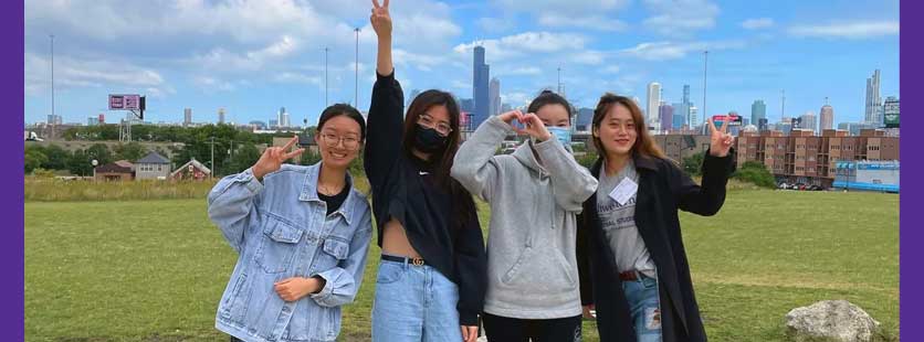 students with Chicago skyline in background